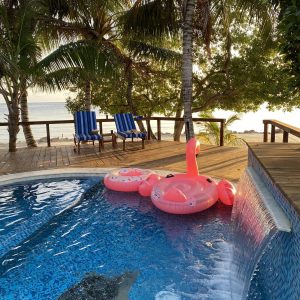 private pool view with oceanfront view at ray caye resort
